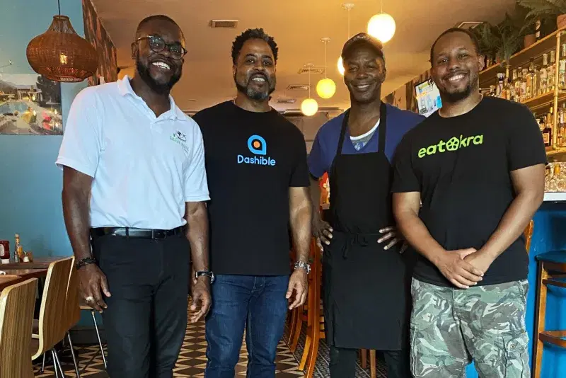 From left: Lawrence Phillips, Marvin Johnson and Anthony Edwards with Sexy Taco's Brian Washington Palmer. Courtesy, Green Book Global
