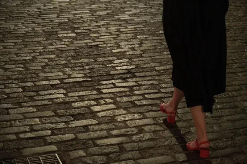 Person walking in cobblestones streets in Meatpacking District