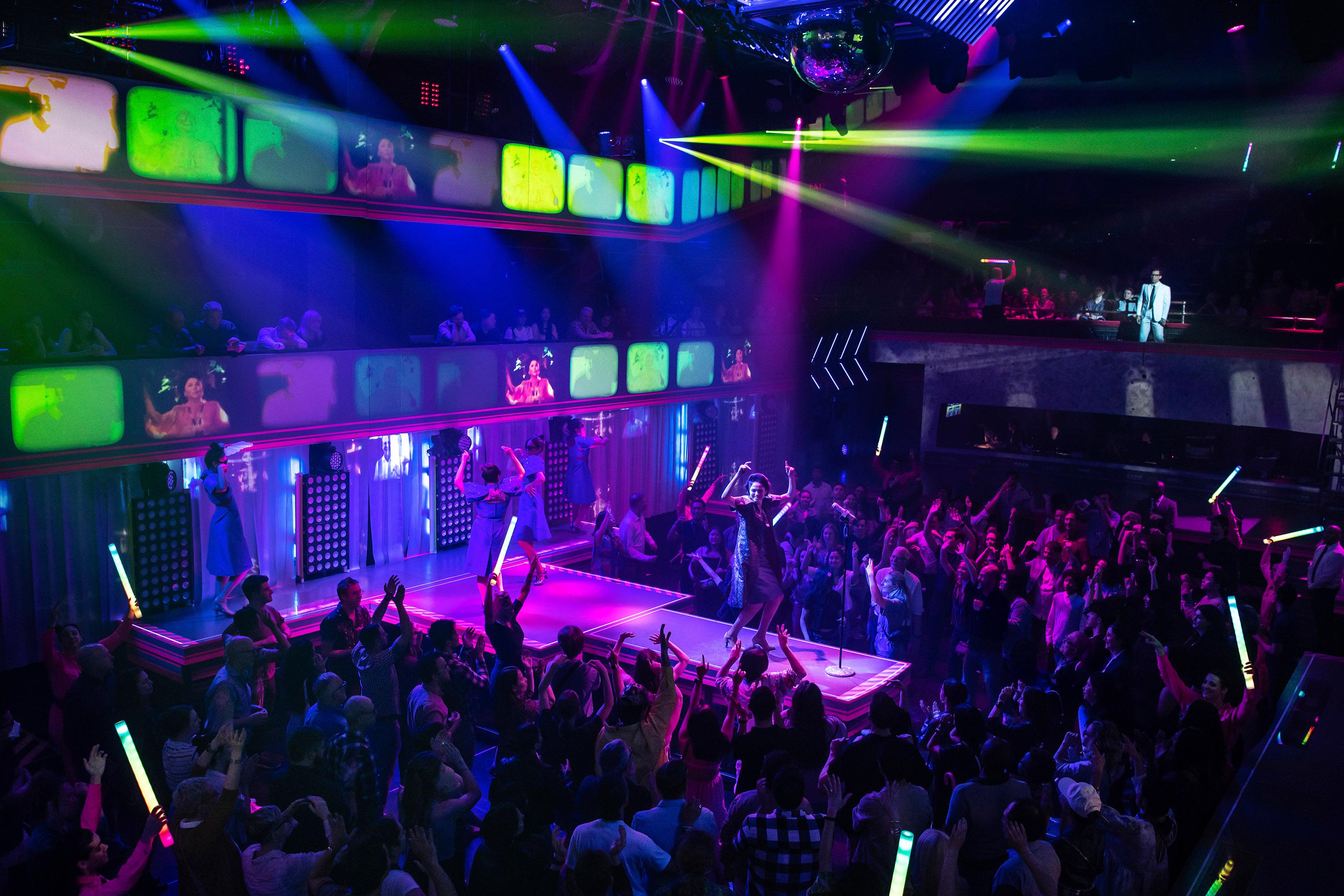 Actors on stage of Here Lies Love Broadway Production