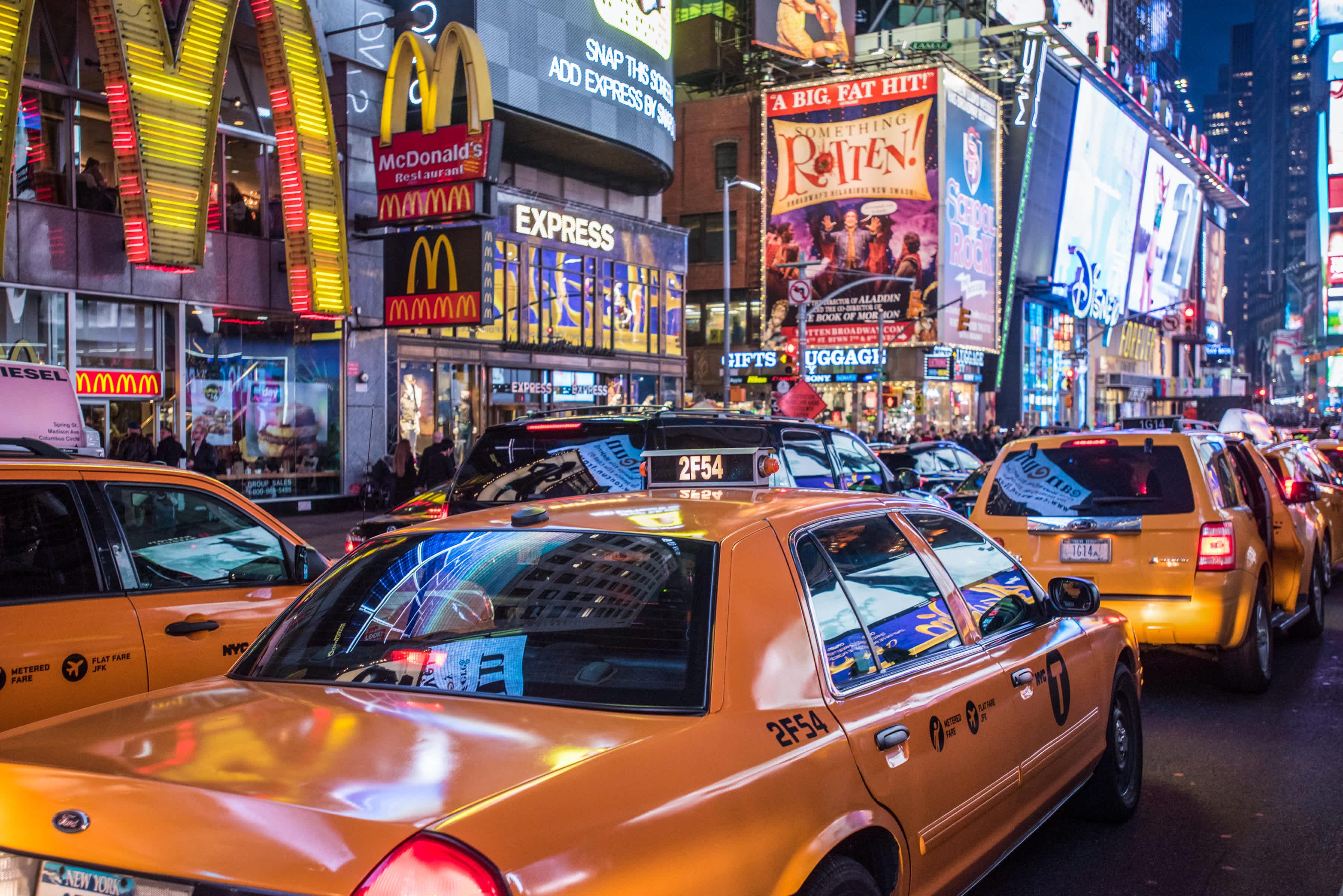Taxis in Times Square NYC at the gloaming