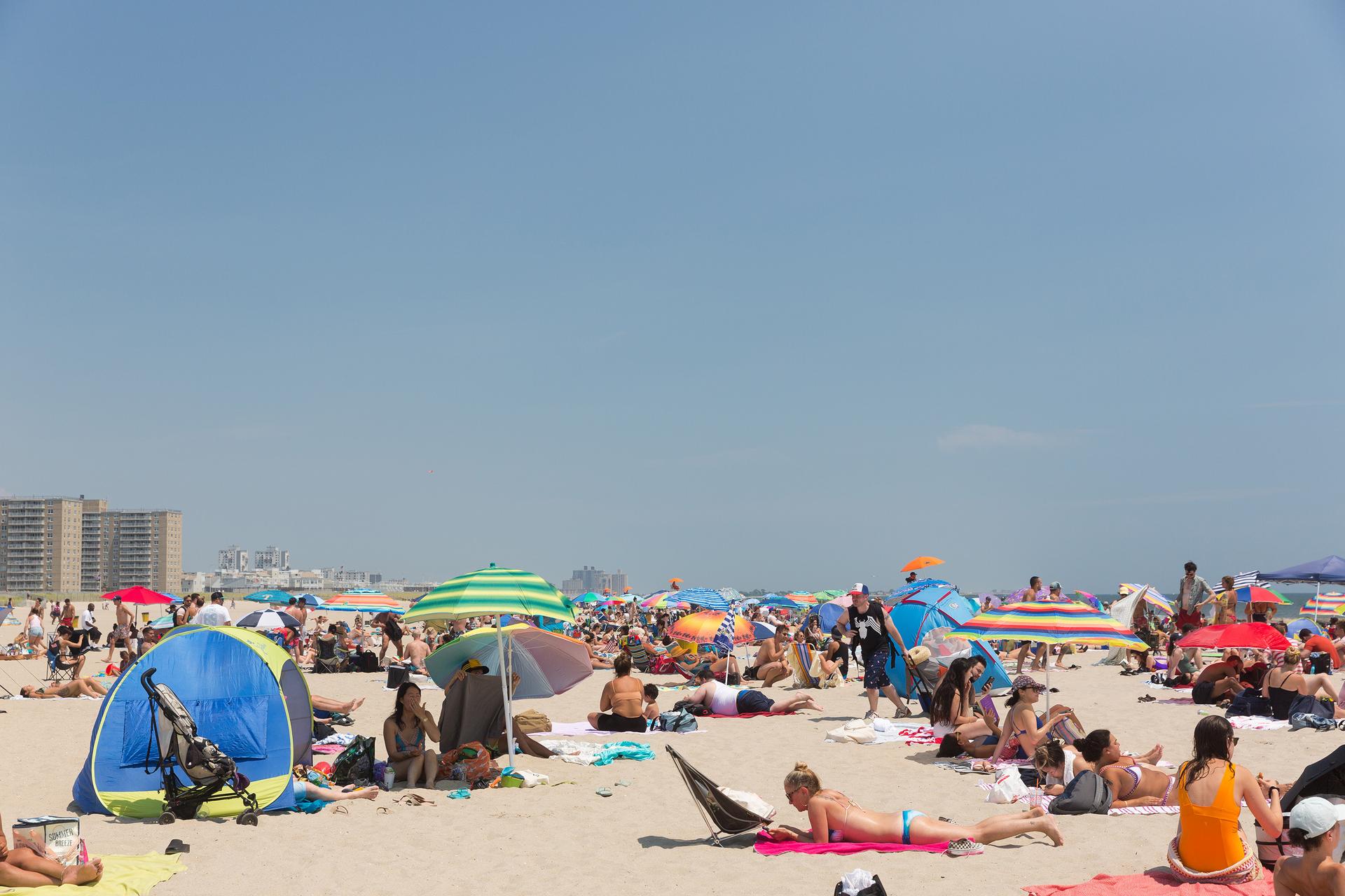 people relaxing on Rockaway Beach