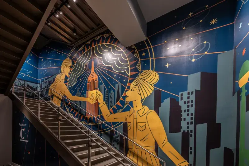 image of the 3 level mural showcasing women in the coffee industry
