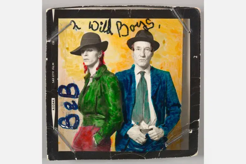 David Bowie with William Burroughs, February 1974. Photograph by Terry O'Neill with color by David Bowie. Courtesy of The David Bowie Archive. Image © Victoria and Albert Museum
