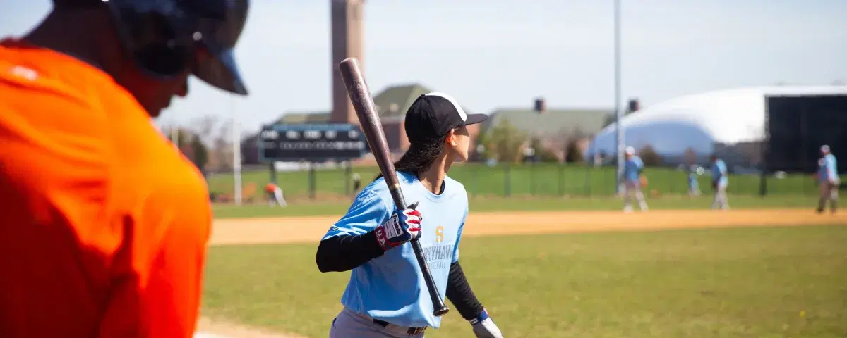 Kelsie Whitmore holding a bat, Staten Island Ferry Hawks Baseball