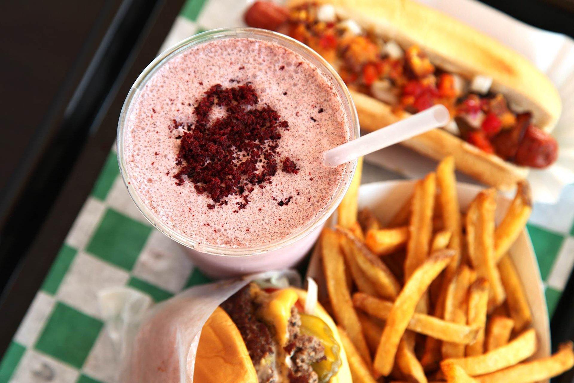 Hot Dog, milkshake, fries and burger at Harlem Shake in NYC
