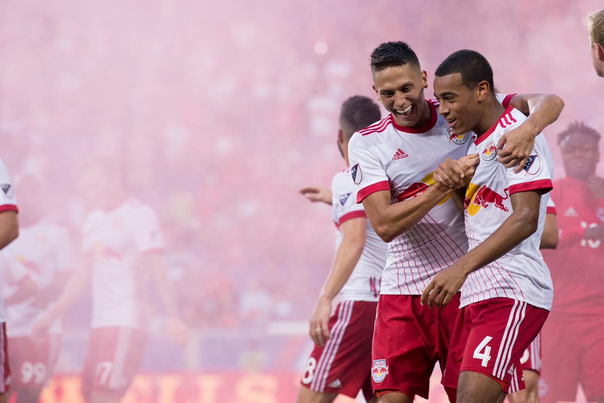 Two soccer players celebrate, New York Red Bulls