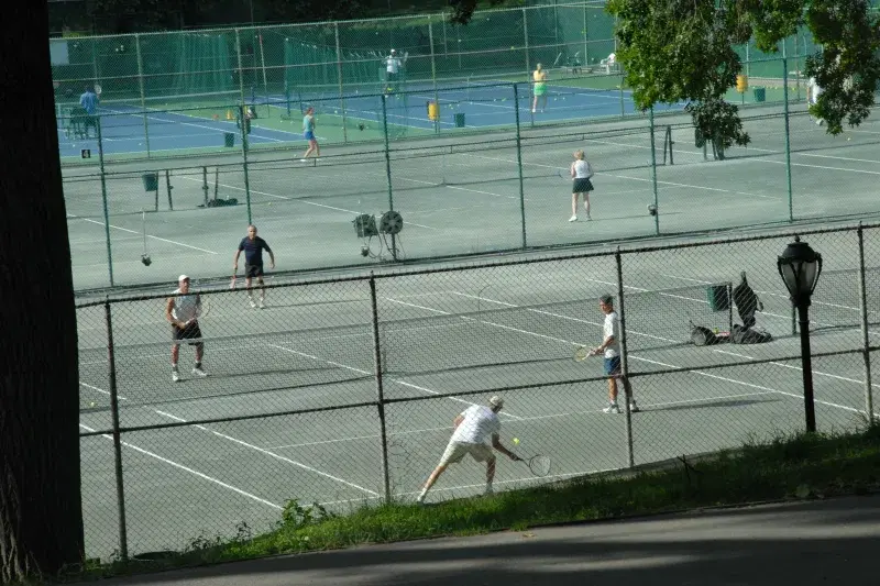 People play tennis at the Tennis Center in Central Park Conservancy, in Manhattan 