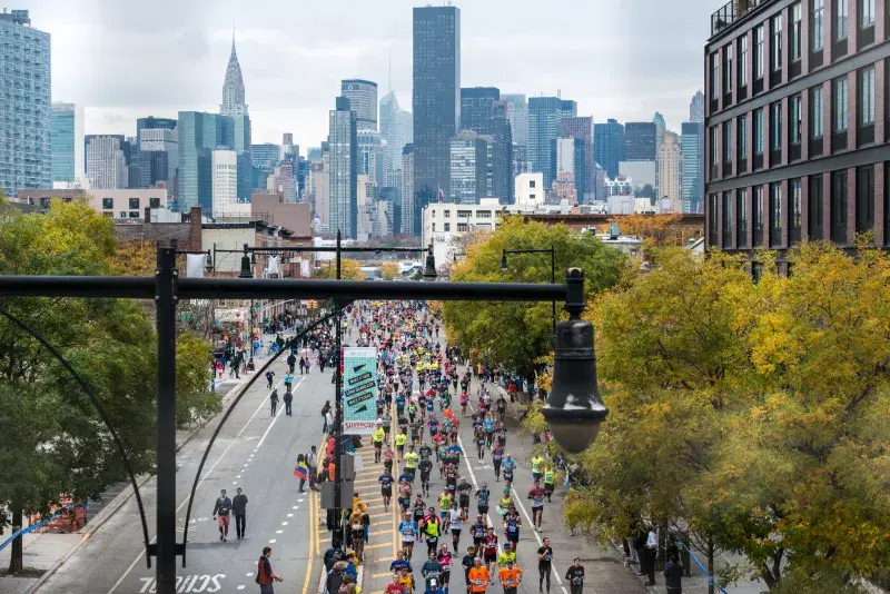 Runners at the NYC Marathon,  journey through all five boroughs