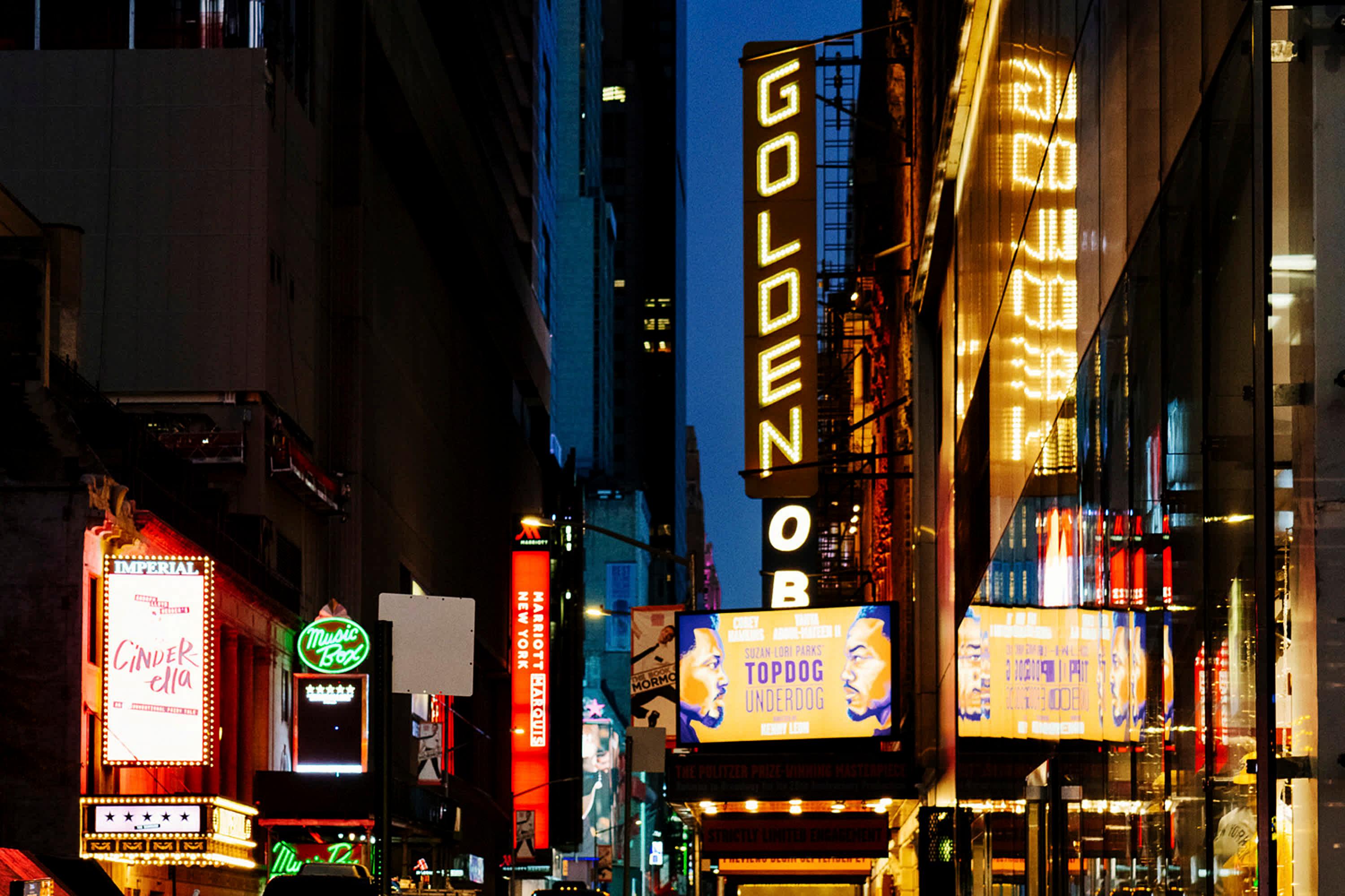 Broadway Marquees illuminated at dusk in Midtown, Manhattan