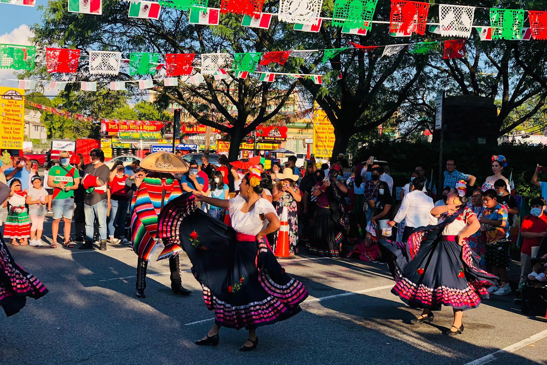 People dance at the Mexican Day Parade