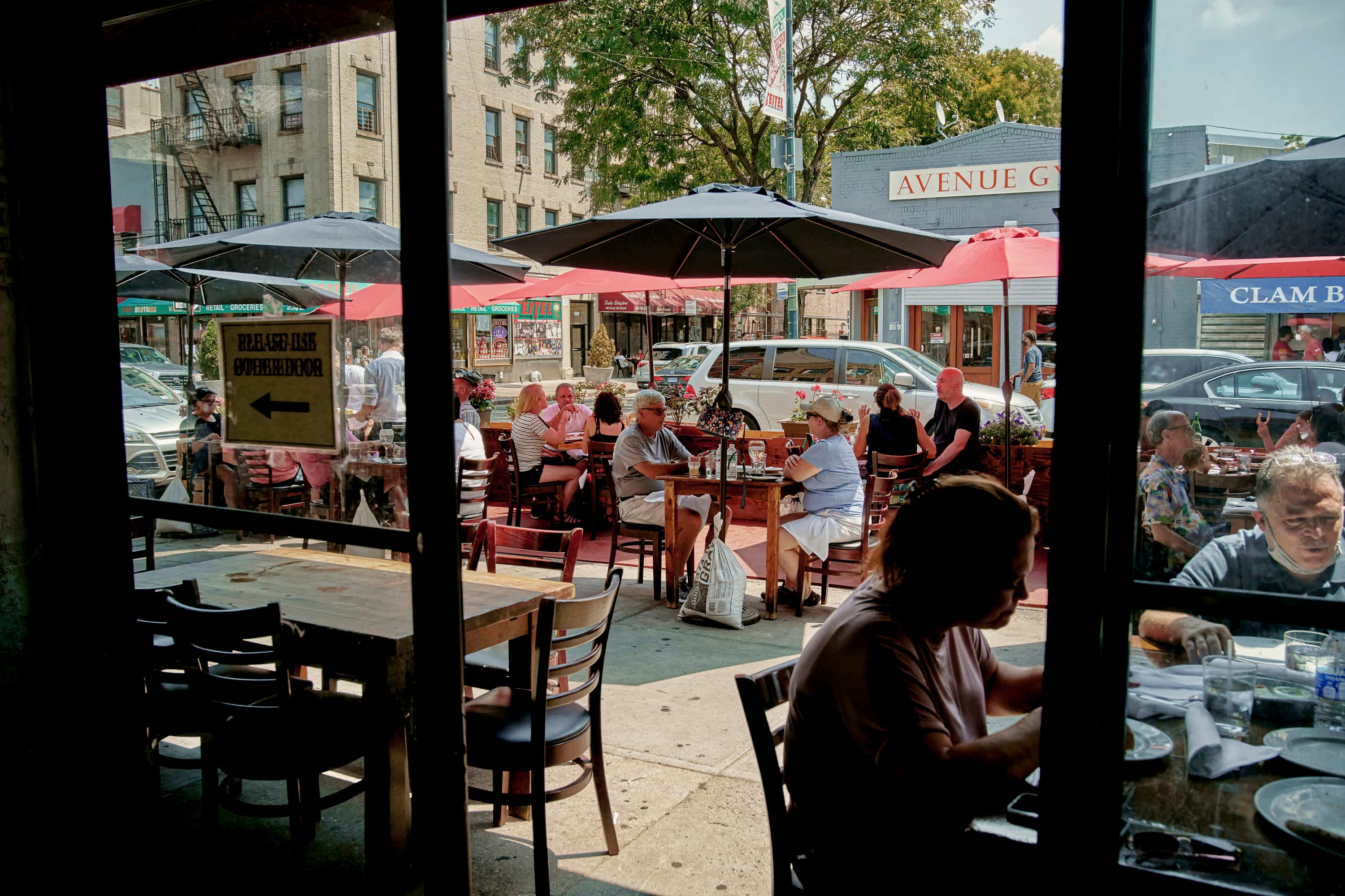 People enjoying their meals at Zero Otto Nove in Belmont, the Bronx