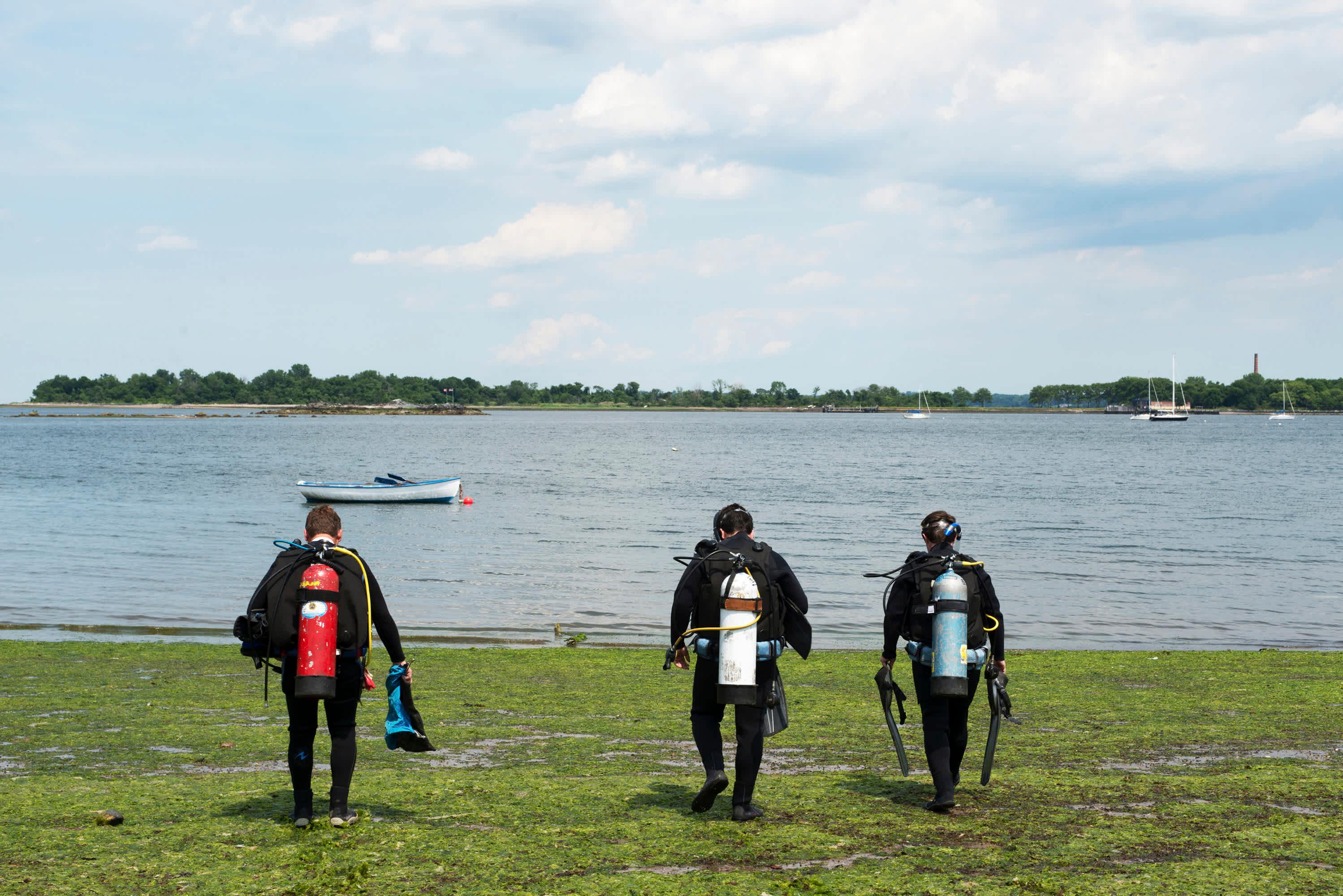 Divers walking to the water in City Island, the Bronx