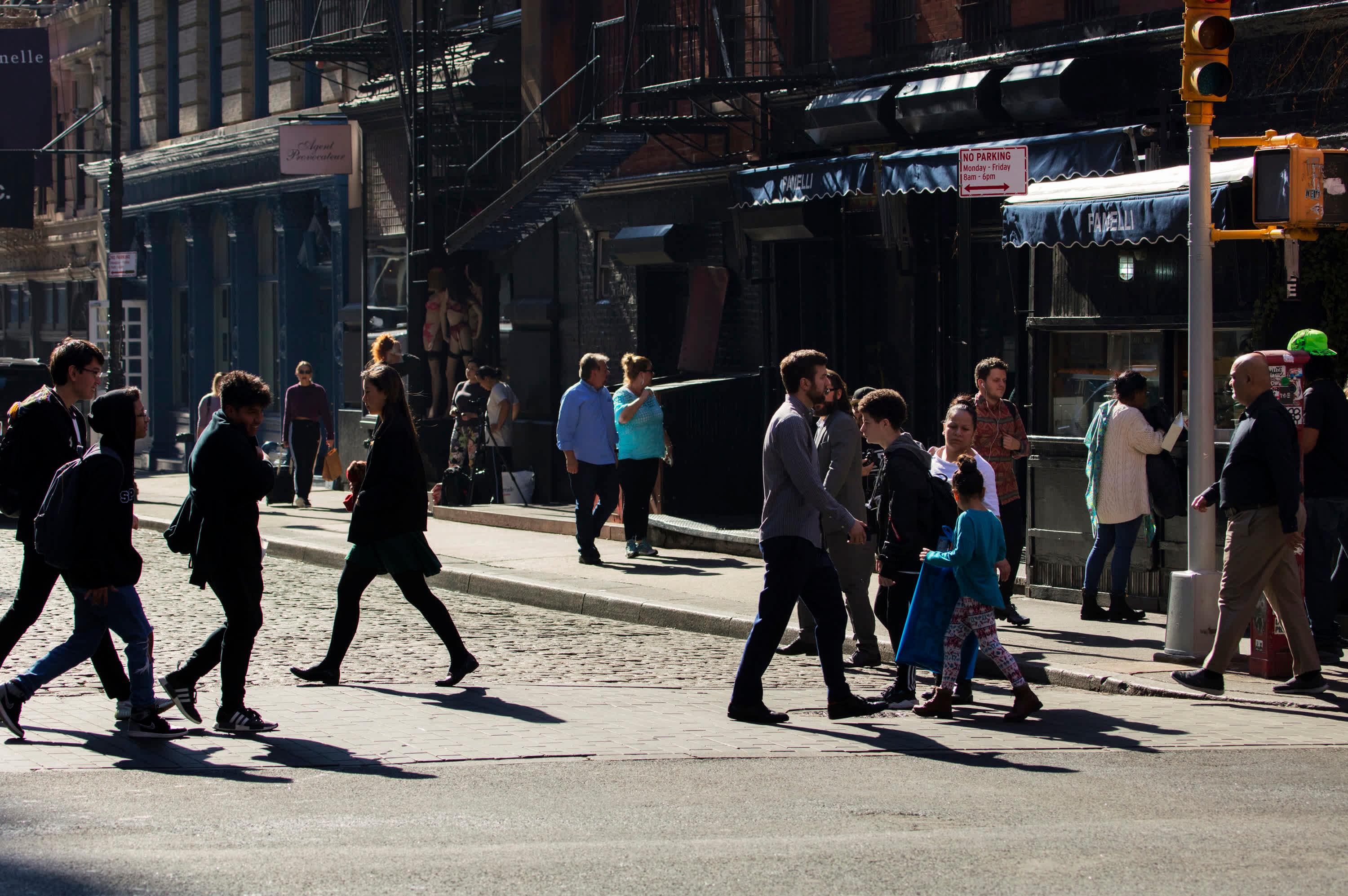 People walking across the street in SoHo, Manhattan